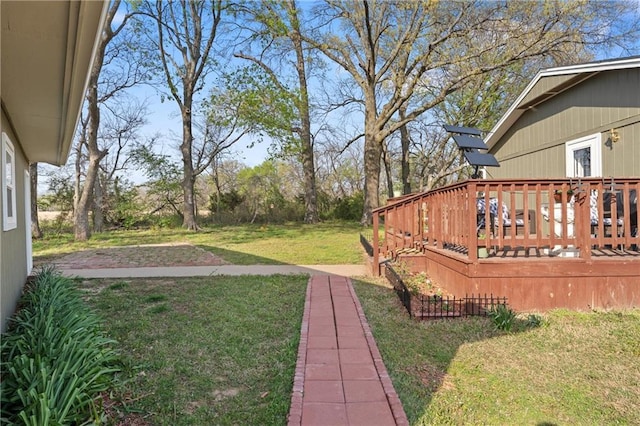 view of yard with a deck