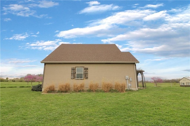 611 NW 1421st Rd, Holden, MO 64040 - view of property exterior featuring a yard