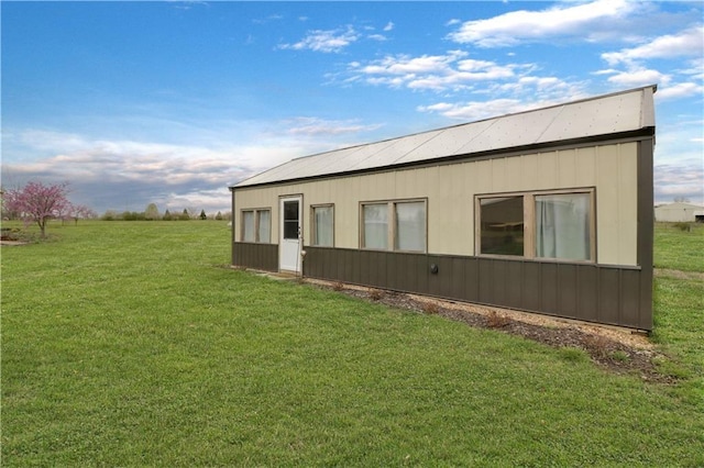 611 NW 1421st Rd, Holden, MO 64040 - view of side of property featuring a lawn