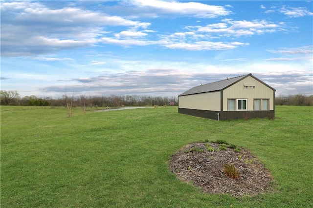 611 NW 1421st Rd, Holden, MO 64040 - view of grassy yard featuring an outbuilding