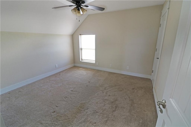 611 NW 1421st Rd, Holden, MO 64040 - unfurnished room featuring a ceiling fan, lofted ceiling, carpet floors, and baseboards