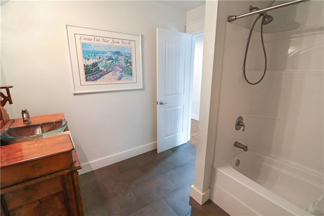 611 NW 1421st Rd, Holden, MO 64040 - full bath featuring baseboards,  shower combination, and a sink