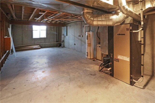 611 NW 1421st Rd, Holden, MO 64040 - below grade area featuring gas water heater and heating unit