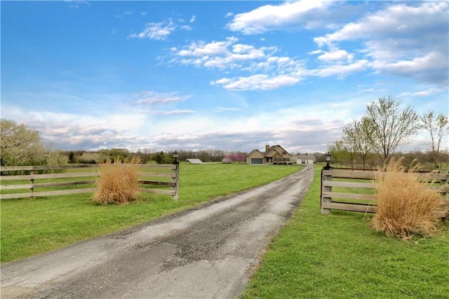 611 NW 1421st Rd, Holden, MO 64040 - view of asphalt driveway with a view of countryside