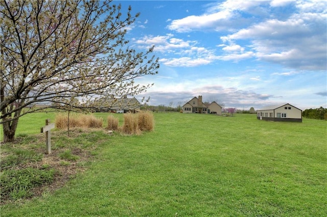 611 NW 1421st Rd, Holden, MO 64040 - view of green lawn