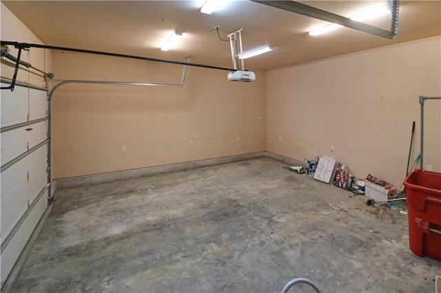 611 NW 1421st Rd, Holden, MO 64040 - garage featuring a garage door opener