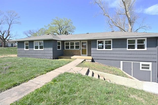ranch-style house featuring a front lawn
