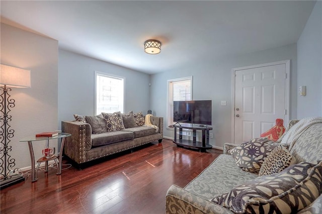 1610 E 37th St, Kansas City, MO 64109 - living area with wood finished floors and baseboards