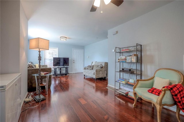 1610 E 37th St, Kansas City, MO 64109 - living area with a ceiling fan and wood finished floors