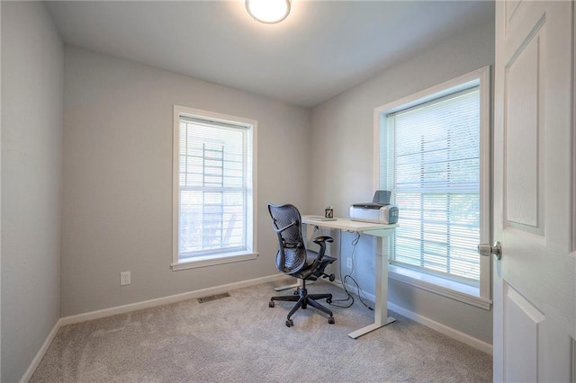 1610 E 37th St, Kansas City, MO 64109 - carpeted home office with visible vents and baseboards