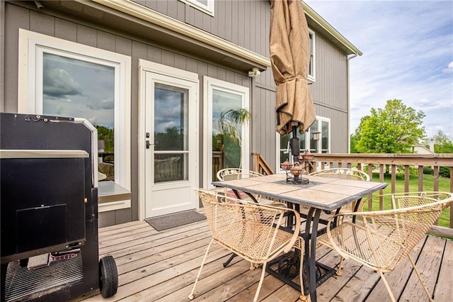 25477 Crestview Dr, Paola, KS 66071 - wooden deck with outdoor dining space