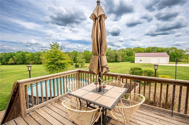 25477 Crestview Dr, Paola, KS 66071 - wooden deck with outdoor dining area and a yard