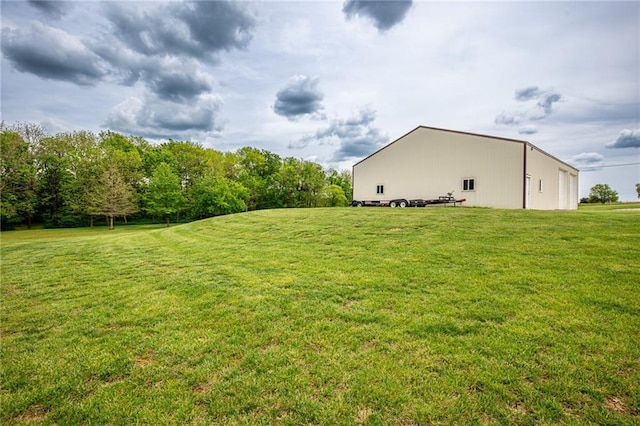 25477 Crestview Dr, Paola, KS 66071 - view of green lawn featuring an outbuilding and an outdoor structure