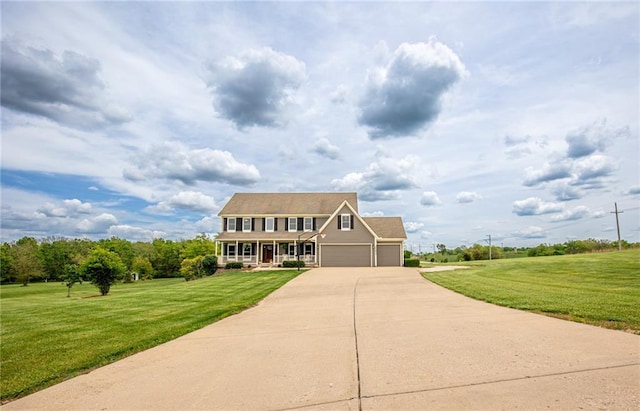 25477 Crestview Dr, Paola, KS 66071 - view of front of house with concrete driveway, a porch, a front lawn, and a garage