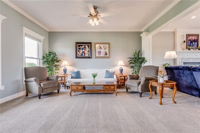 25477 Crestview Dr, Paola, KS 66071 - carpeted living room featuring ornamental molding, a ceiling fan, a large fireplace, and baseboards