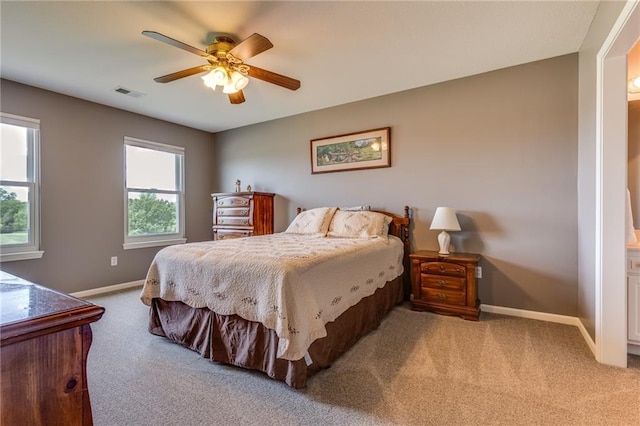 25477 Crestview Dr, Paola, KS 66071 - carpeted bedroom featuring baseboards and a ceiling fan