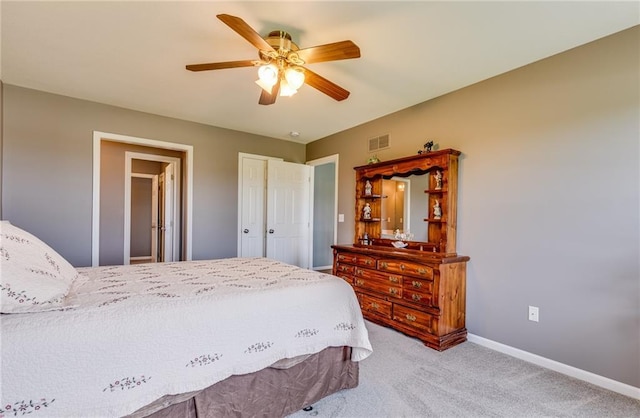 25477 Crestview Dr, Paola, KS 66071 - carpeted bedroom with baseboards and a ceiling fan