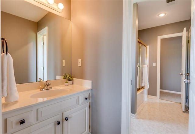 25477 Crestview Dr, Paola, KS 66071 - full bath featuring vanity,  shower combination, and baseboards