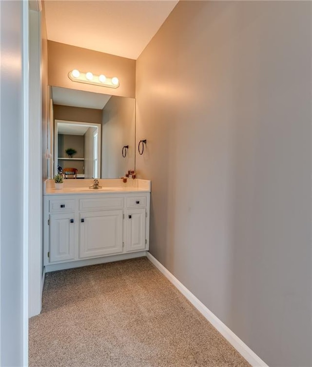 25477 Crestview Dr, Paola, KS 66071 - bathroom with vanity and baseboards