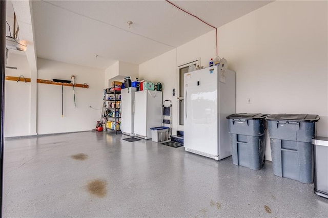 25477 Crestview Dr, Paola, KS 66071 - garage with freestanding refrigerator