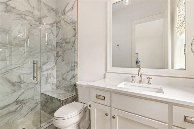 11316 W 170th Ter, Overland Park, KS 66221 - full bathroom with a marble finish shower, vanity, and toilet