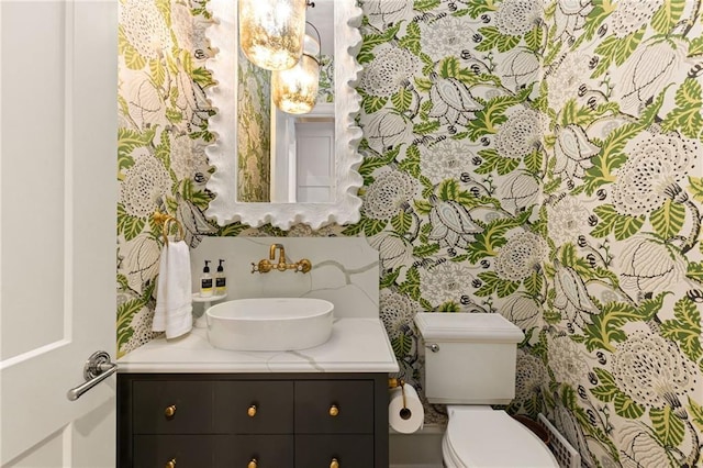 11316 W 170th Ter, Overland Park, KS 66221 - bathroom with vanity, toilet, and a chandelier