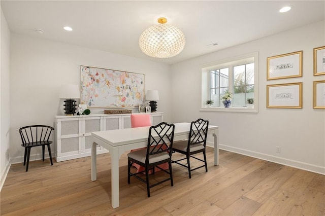 11316 W 170th Ter, Overland Park, KS 66221 - dining space featuring light wood-type flooring, baseboards, recessed lighting, and a chandelier