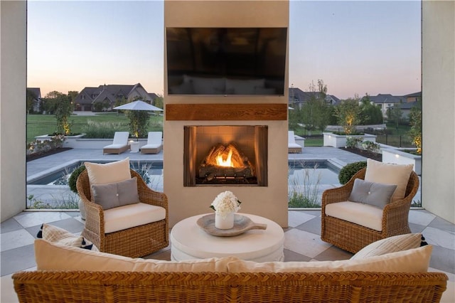 11316 W 170th Ter, Overland Park, KS 66221 - view of patio with a lit fireplace