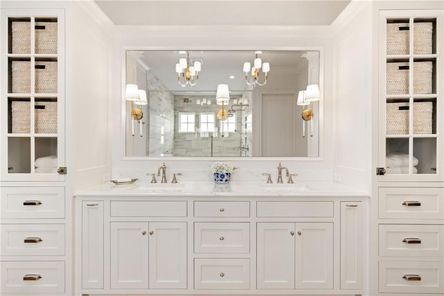 11316 W 170th Ter, Overland Park, KS 66221 - bathroom with a chandelier, a stall shower, ornamental molding, and double vanity