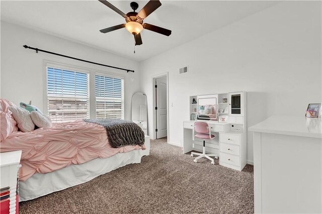1237 Hillmann Ln, Warrensburg, MO 64093 - carpeted bedroom featuring baseboards and a ceiling fan