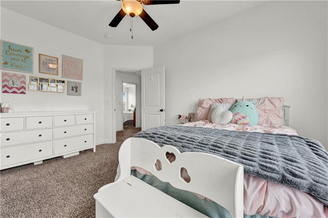 1237 Hillmann Ln, Warrensburg, MO 64093 - bedroom with dark colored carpet and ceiling fan