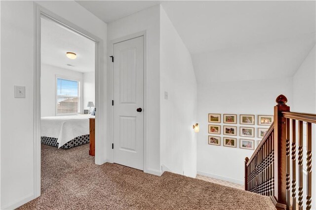 1237 Hillmann Ln, Warrensburg, MO 64093 - hall with an upstairs landing and carpet floors