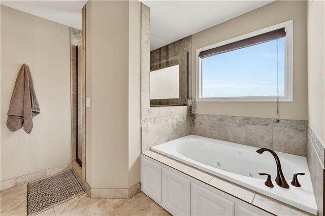 1237 Hillmann Ln, Warrensburg, MO 64093 - bathroom featuring a tub with jets and a shower stall