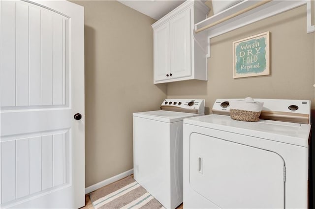 1237 Hillmann Ln, Warrensburg, MO 64093 - laundry room with washer and dryer and cabinet space