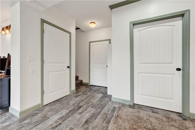 1237 Hillmann Ln, Warrensburg, MO 64093 - unfurnished bedroom with wood finished floors and baseboards