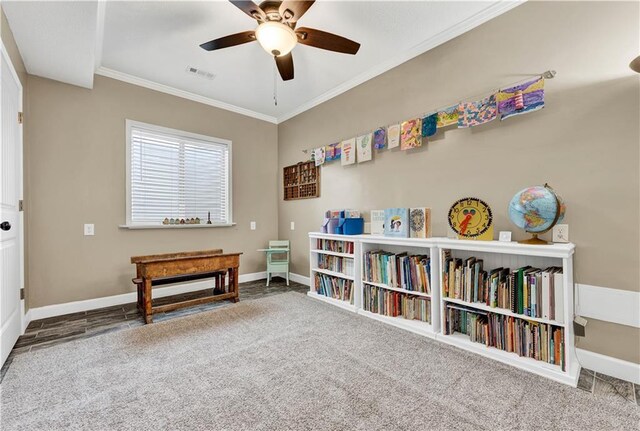 1237 Hillmann Ln, Warrensburg, MO 64093 - sitting room featuring ornamental molding, ceiling fan, and carpet floors
