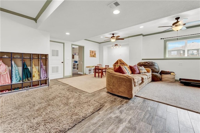 1237 Hillmann Ln, Warrensburg, MO 64093 - living area with a ceiling fan, crown molding, wood finished floors, and recessed lighting