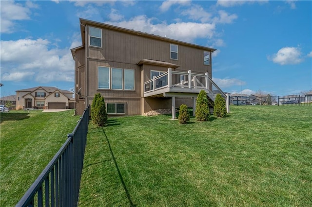 1237 Hillmann Ln, Warrensburg, MO 64093 - rear view of house featuring a fenced backyard, a deck, and stairs