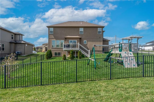 1237 Hillmann Ln, Warrensburg, MO 64093 - back of house with a fenced backyard and a deck