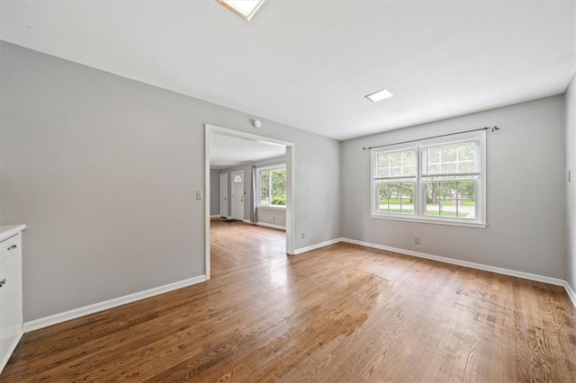 2015 Somerset Dr, Prairie Village, KS 66206 - empty room featuring wood finished floors and baseboards
