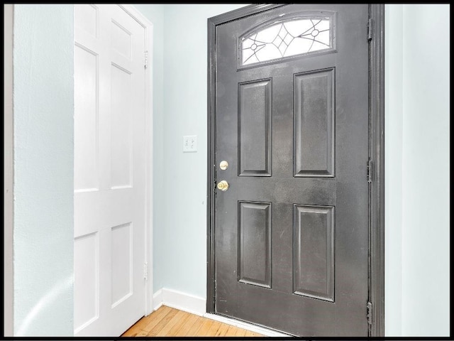 165 S Miami Ave, Marshall, MO 65340 - entryway featuring light wood-type flooring and baseboards