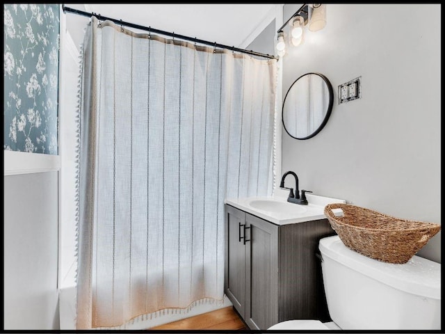 165 S Miami Ave, Marshall, MO 65340 - full bath featuring vanity, toilet, and a shower with shower curtain