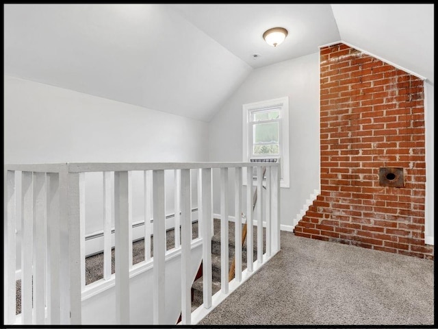 165 S Miami Ave, Marshall, MO 65340 - hall featuring cooling unit, brick wall, carpet, an upstairs landing, and lofted ceiling