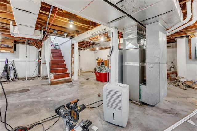 165 S Miami Ave, Marshall, MO 65340 - unfinished below grade area featuring heating unit and stairway
