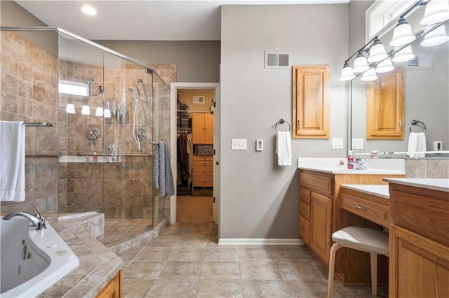full bathroom with visible vents, baseboards, a jetted tub, vanity, and a stall shower
