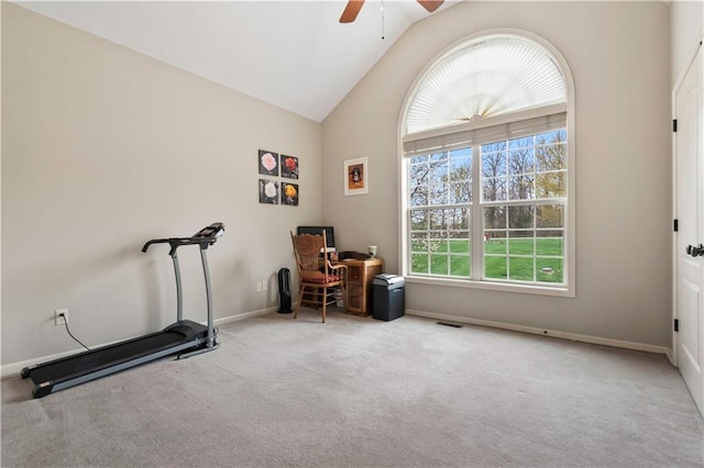 workout room featuring visible vents, baseboards, ceiling fan, carpet floors, and high vaulted ceiling