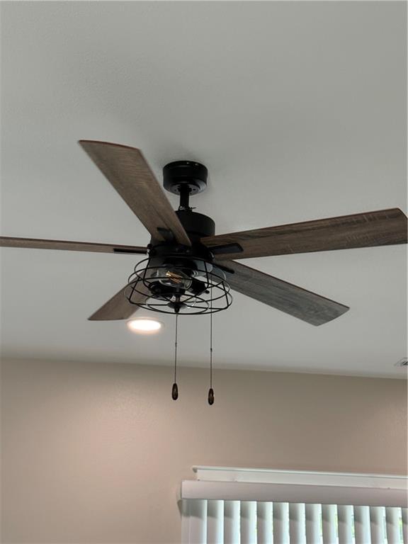 101 N Maple St, Butler, MO 64730 - detailed view of ceiling fan