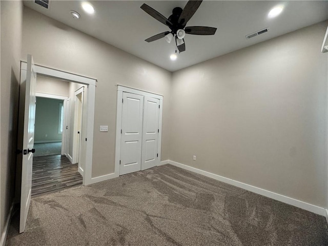 101 N Maple St, Butler, MO 64730 - unfurnished bedroom with carpet flooring, baseboards, recessed lighting, and a ceiling fan
