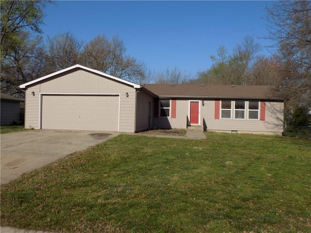 518 S Pine, Ottawa, KS 66067 - single story home featuring concrete driveway, a front yard, and an attached garage