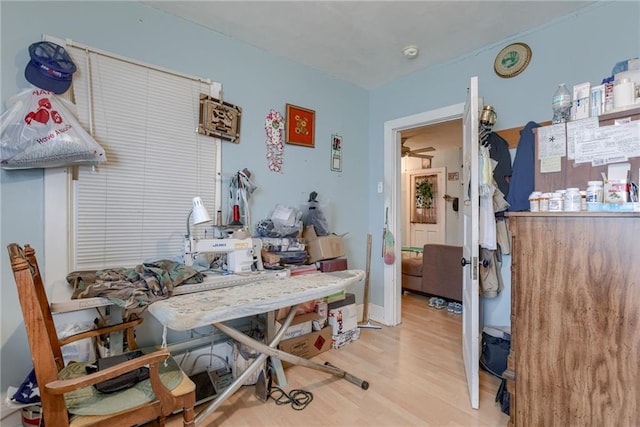 dining area with wood finished floors
